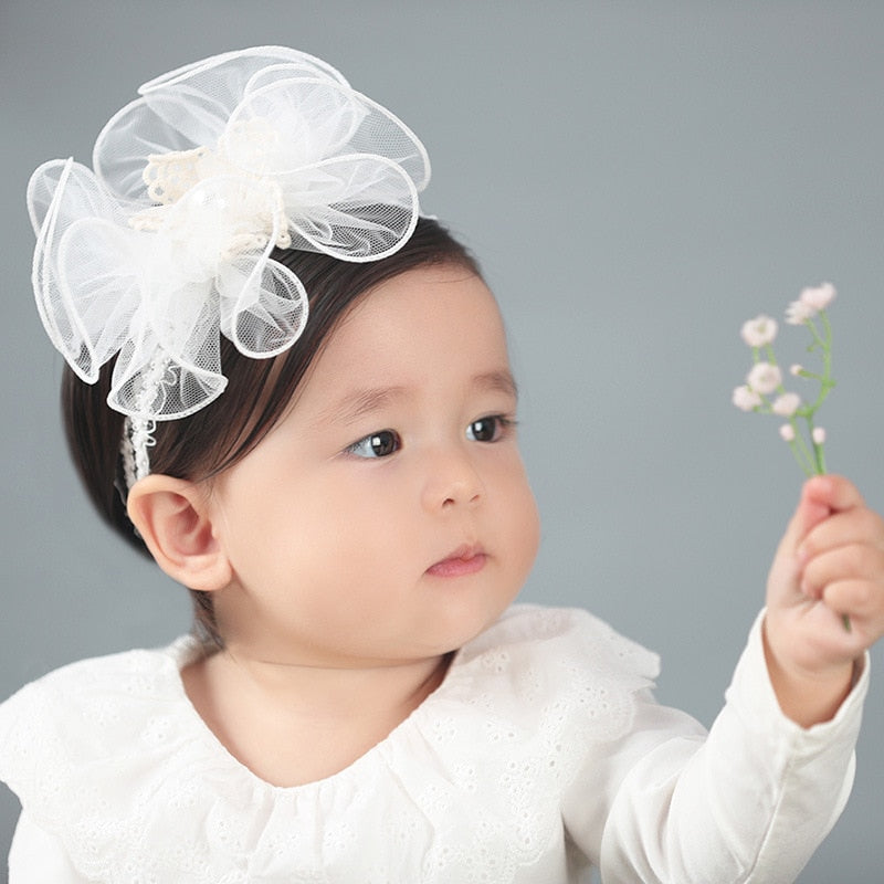 Hodepynt til baby - luebutikken.no